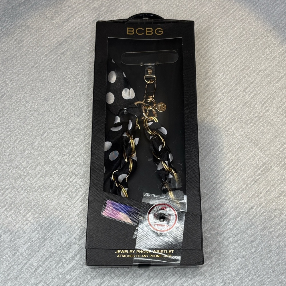 BCBG Gold Chain Wristlet with Black & White Polka Dot Ribbon